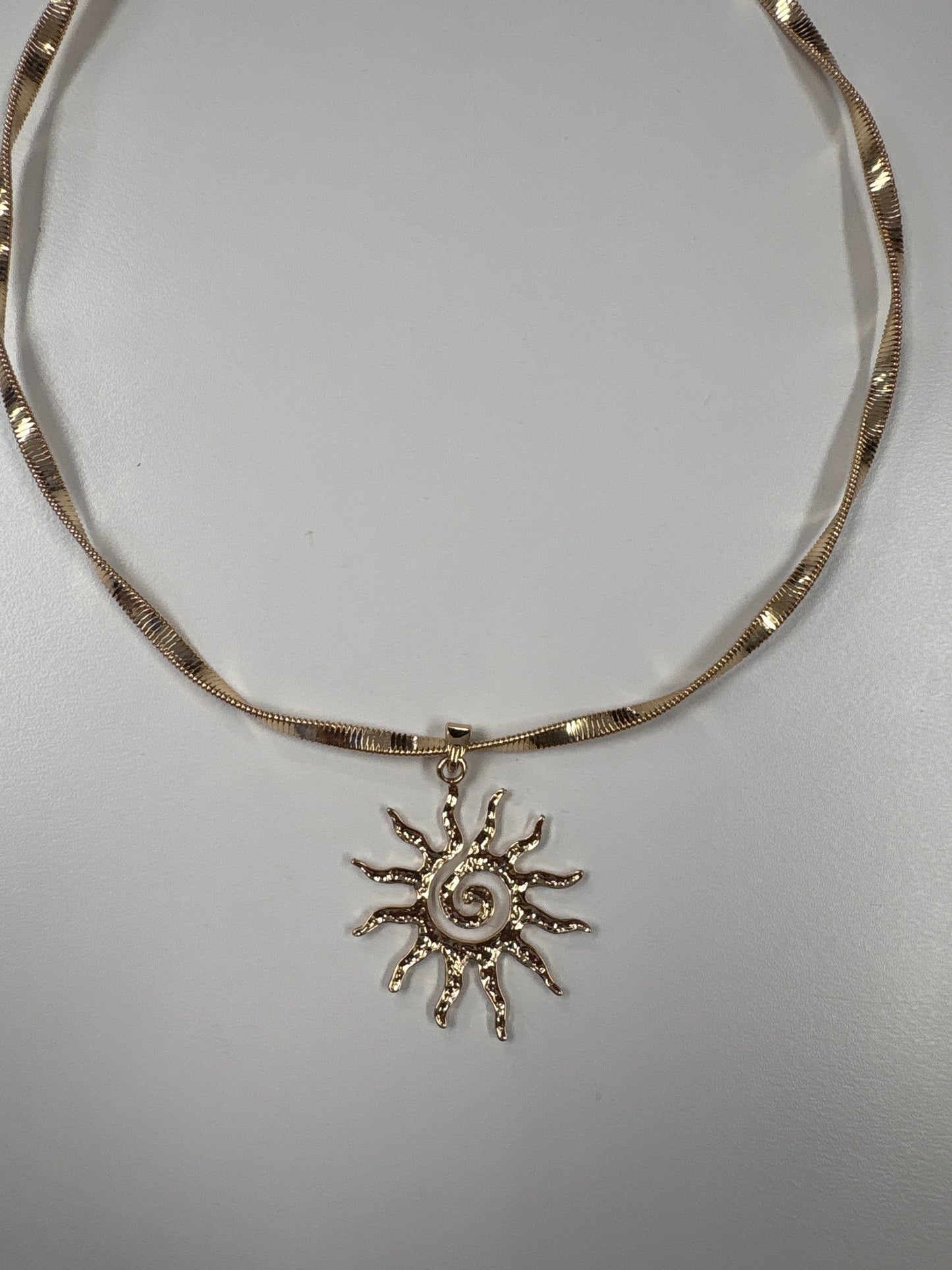 Spiral sun necklace