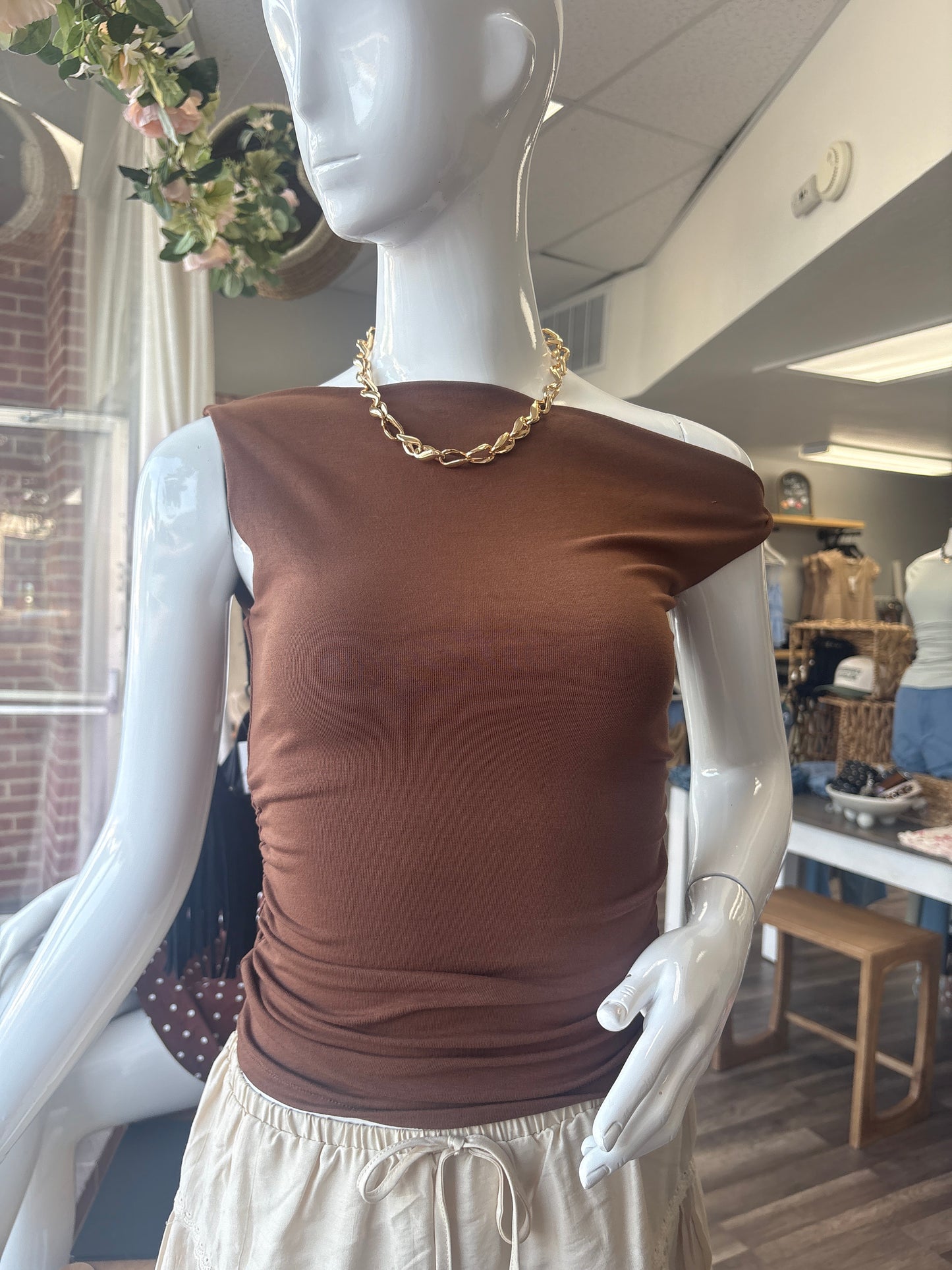 Brown asymmetrical top