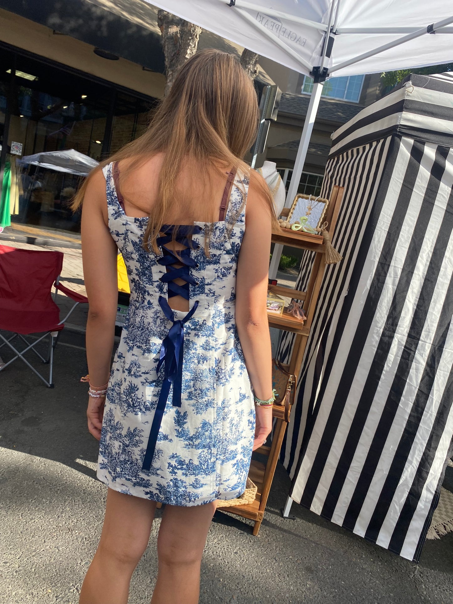 Very demure with back bow dress