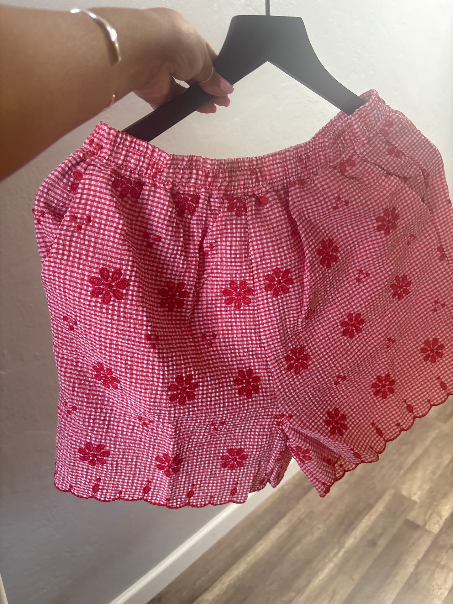 Red floral shorts
