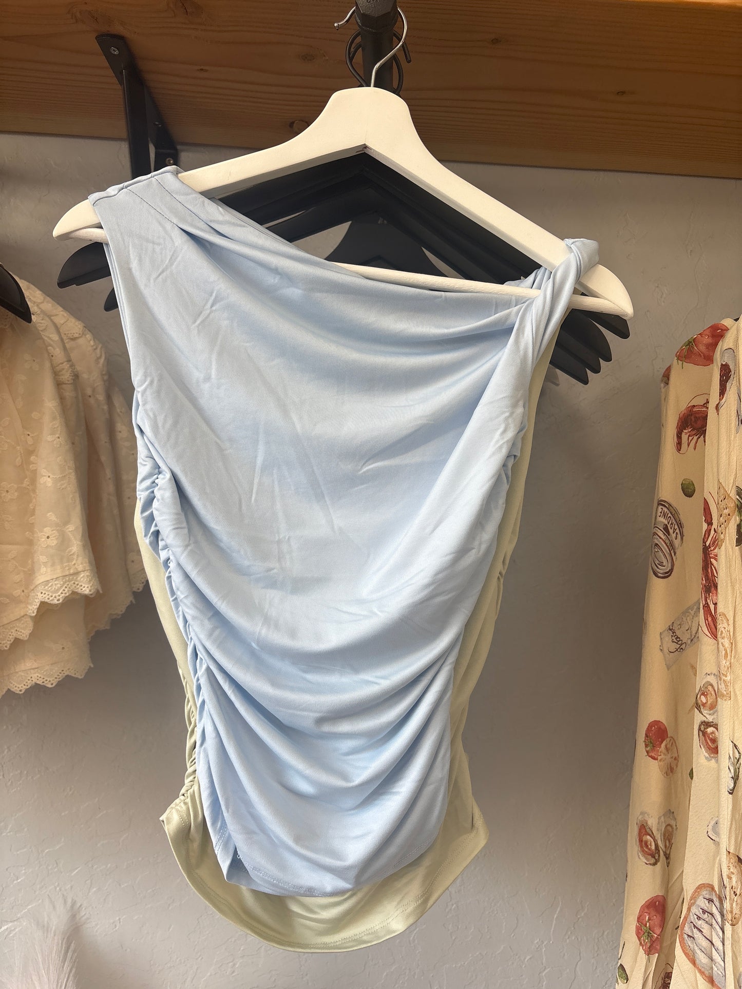 Asymmetrical off the shoulder top light blue