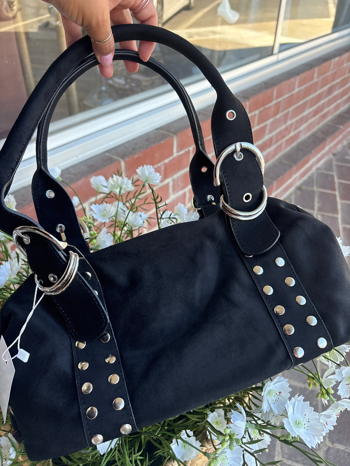 Black studed bag